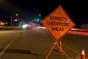 sobriety checkpoint sign indicating duis aplenty